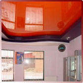 Натяжные потолки оранжевого цвета